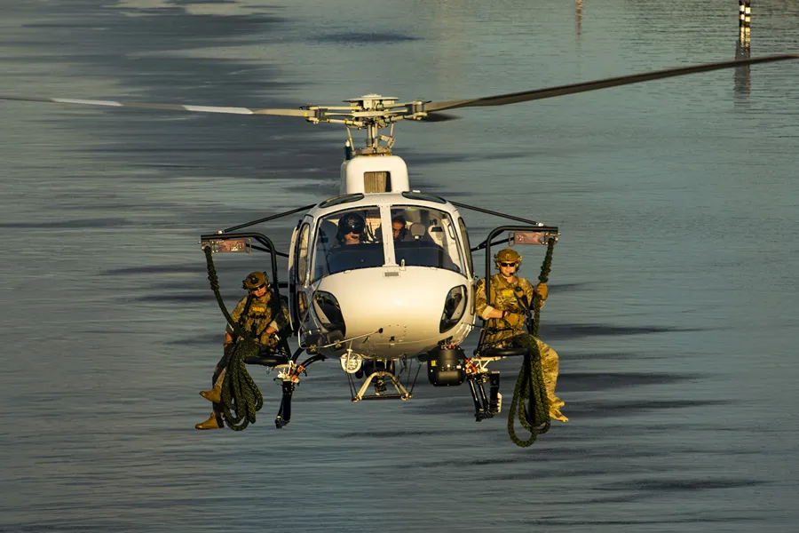 law enforcement officers on helicopter