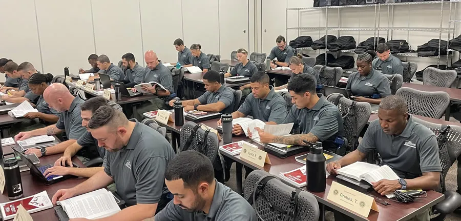 Classroom full of cadets studying