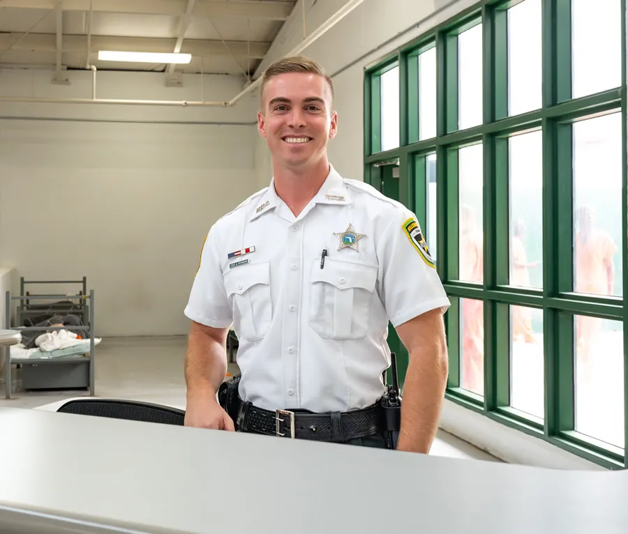 deputy in uniform smiling warmly