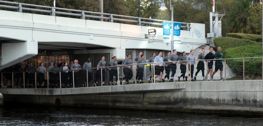 training class on a group run with instructors